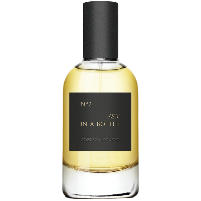 Perfume bottle labeled 'Sex in a Bottle' by Pauline Reiffel on a white background
