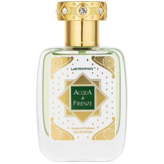 Perfume bottle with gold cap and decorative label on a white background