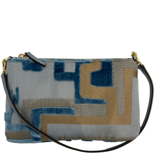 Wristlet with geometric pattern on a white background