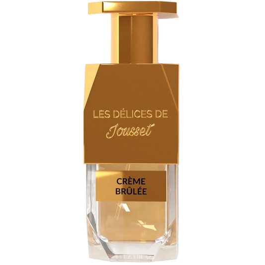 Gold and clear perfume bottle labeled 'Les Delices de Jouset' on a white background
