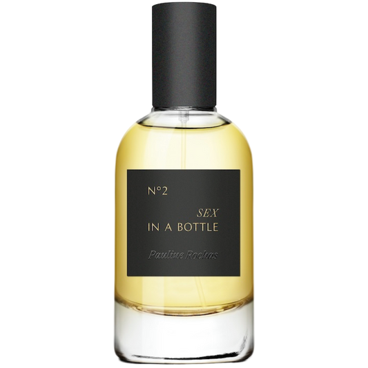 Perfume bottle labeled 'Sex in a Bottle' by Pauline Reiffel on a white background
