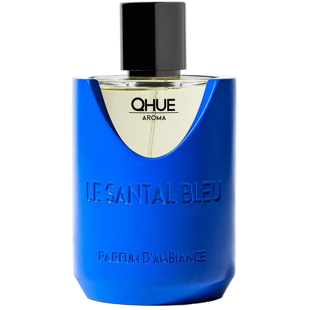 Blue perfume bottle with black cap labeled 'Qhue Aroma Le Santal Bleu' on a white background