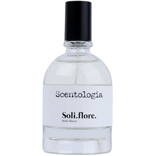 Clear bottle of Scentologia Soli.flore on a white background