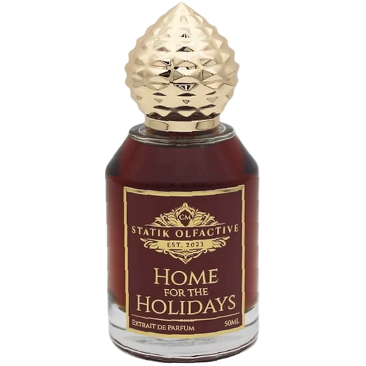 Perfume bottle labeled 'Home for the Holidays' by Statik Olfactive on a white background