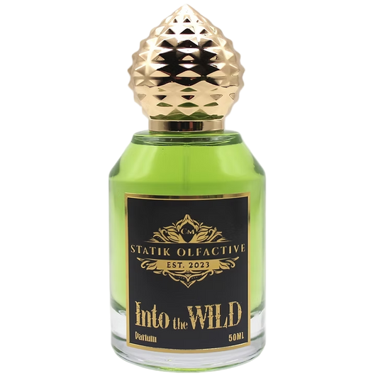 Perfume bottle labeled 'Into the Wild' by Statik Olfactive on a white background