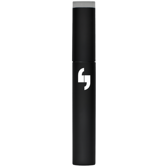 Black cylindrical mascara tube with a white logo on a white background