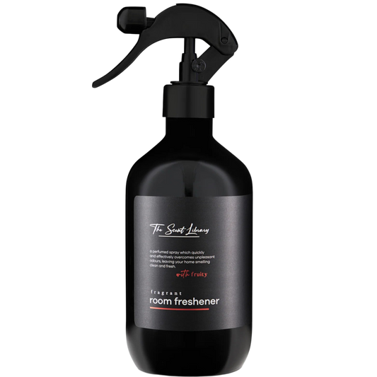 Black room freshener spray bottle with a label on a white background