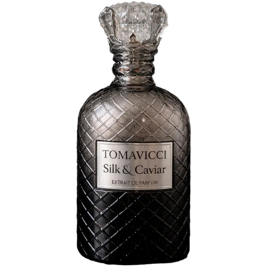 Perfume bottle gradient from black to silver with a clear crystal cap