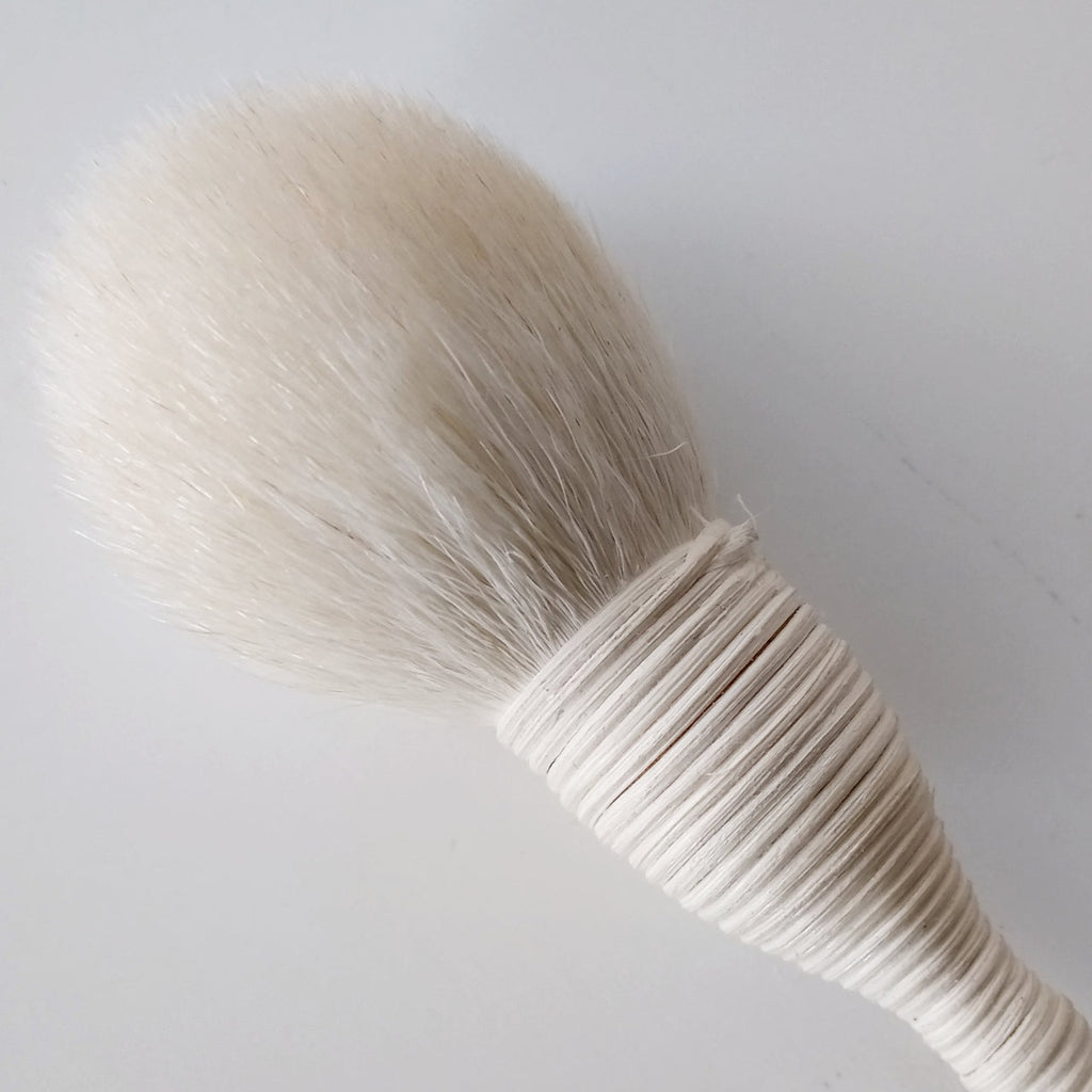 charmed all over face brush - emanuel new york
