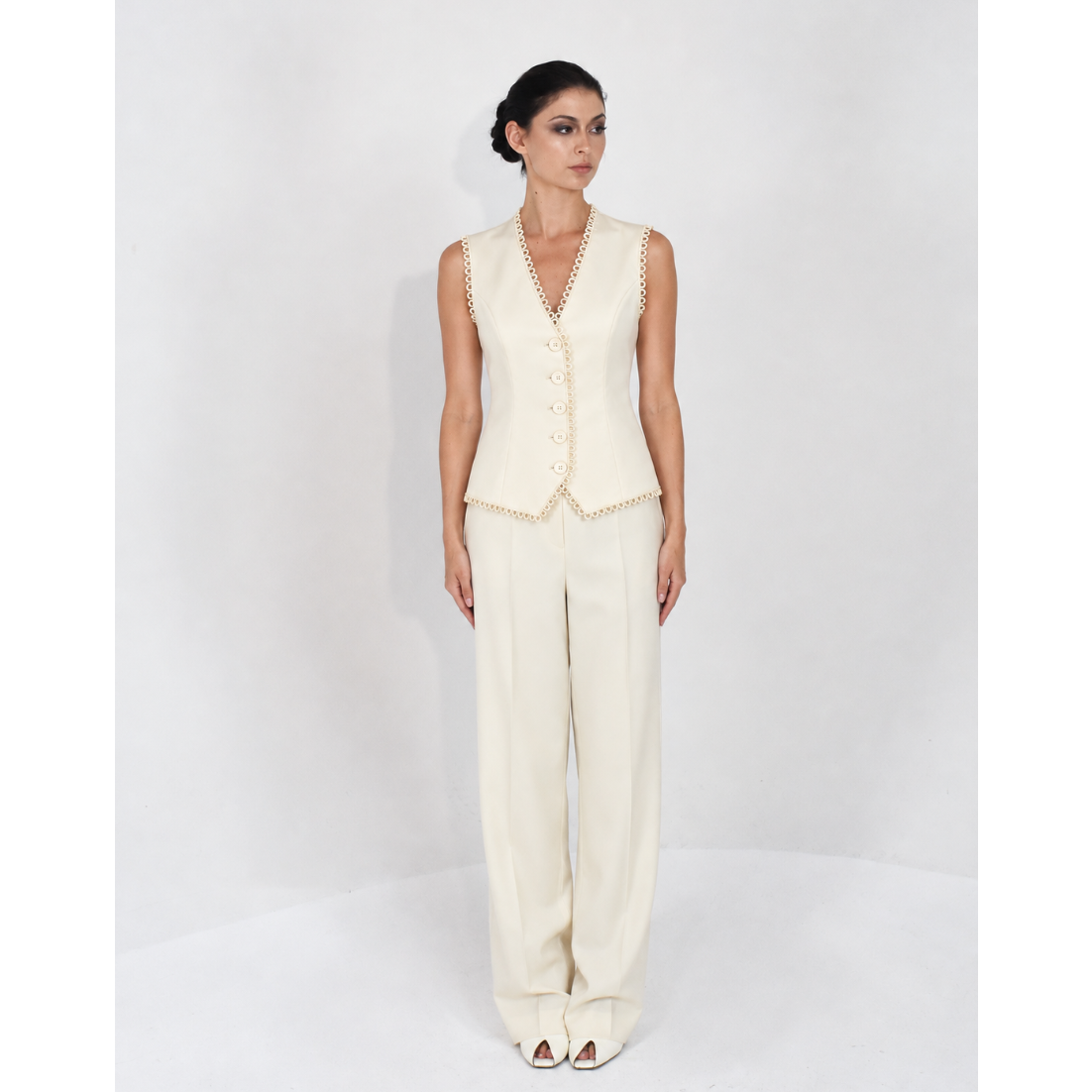 arabesque trimmed vest