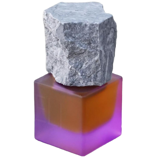 Bottle of boka ziveli perfume with a white background